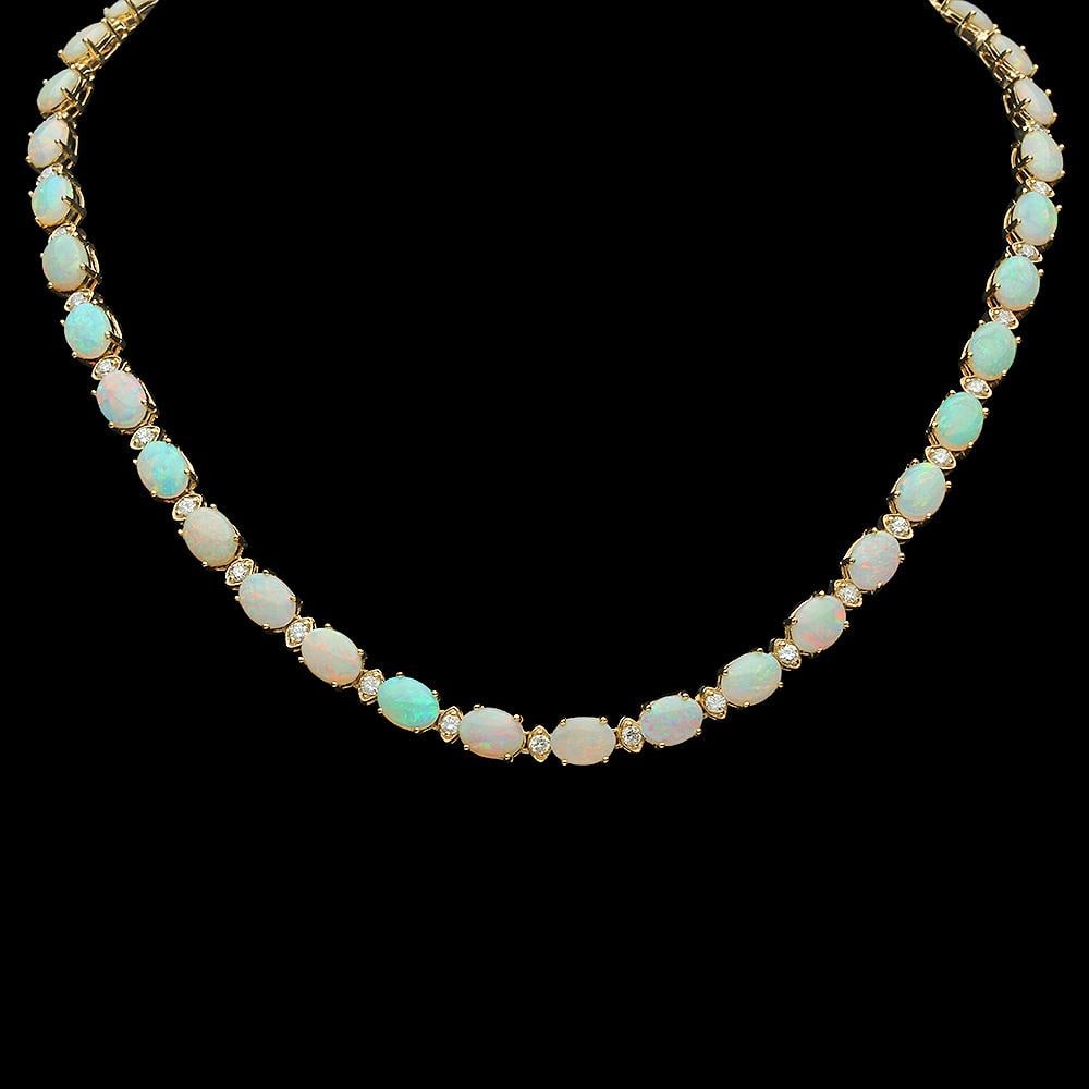 14K Gold 24.51ct Opal 2.24ct Diamond Necklace: Retail: $23,110.00 ****** 14K Gold 24.51ct Opal 2.24ct Diamond Necklace ****** Metal: 14K Solid Gold / Total Item Weight: 28.5 grams / Country Made: United States / / Main Stone: Opal / Color: Play of