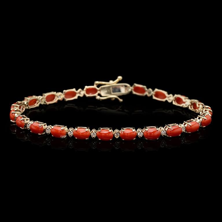 14k Gold 7.48ct Coral 0.50ct Diamond Bracelet: Retail: $7,170.00******14k Gold Coral & Diamond Bracelet ****** Metal: Solid Gold / Total Item Weight: 8.5 grams / Country Made: United States / / Main Stone: Coral / Color: Blue / Carat Total Weight: