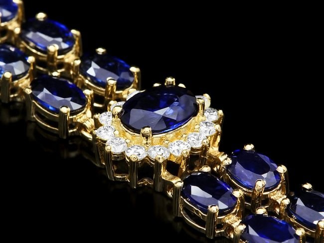 14k Gold 22ct Sapphire 1.50ct Diamond Bracelet: Retail: $21,850.00 ****** 14k Gold 22ct Sapphire 1.50ct Diamond Bracelet ****** Metal: 14k Solid Yellow Gold / Size: 7 / Total Item Weight: 19 grams / Country Made: United States / / Main Stone: Sapph