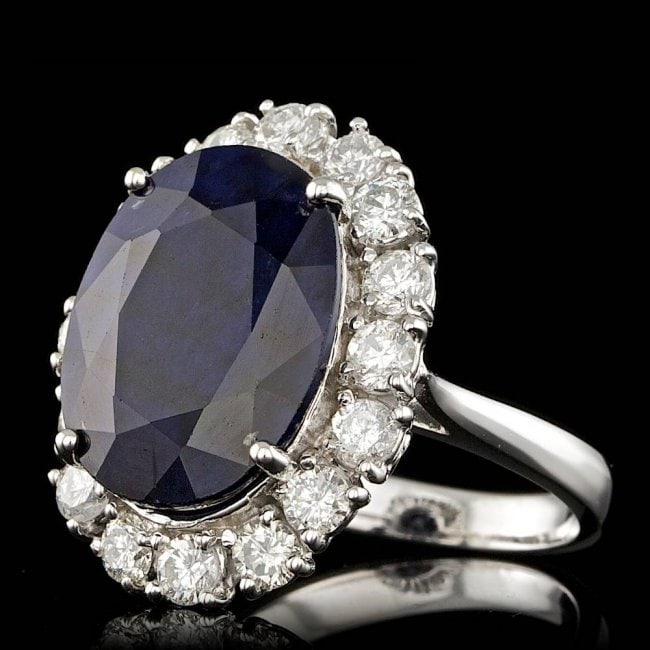 14k Gold 10.00ct Sapphire 1.90ct Diamond Ring: Retail: $18,000.00 ****** 14k Gold 10.00ct Sapphire 1.90ct Diamond Ring ****** Metal: 14k Solid White Gold / Size: 7 / Total Item Weight: 9.5 grams / Country Made: United States / / Main Stone: Sapphi