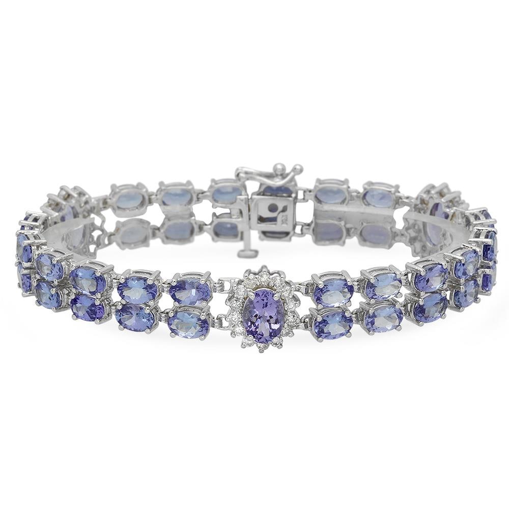 14K Gold 18.47ct Tanzanite 1.28ct Diamond Bracelet: Retail: $19,524.00 ****** 14K Gold 18.47ct Tanzanite 1.28ct Diamond Bracelet ****** Metal: 14K Solid Gold / Total Item Weight: 18.5 grams / Country Made: United States / / Main Stone: Tanzanite / Colo