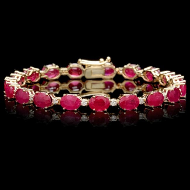 14k Gold 23.50ct Ruby 0.80ct Diamond Bracelet: Retail: $15,600.00 ****** 14k Gold 23.50ct Ruby 0.80ct Diamond Bracelet ****** Metal: 14k Solid Yellow Gold / Size: 7 / Total Item Weight: 13.5 grams / Country Made: United States / / Main Stone: Ruby