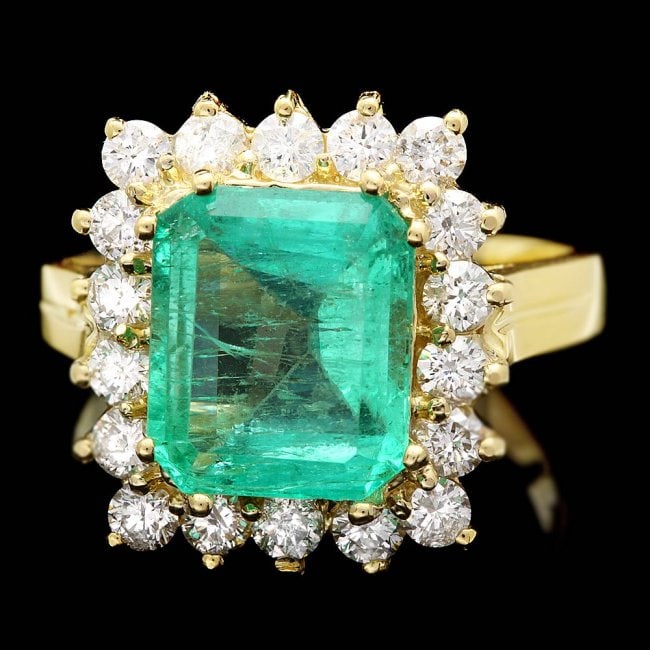 18k Gold 4.00ct Emerald 1.00ct Diamond Ring: Retail: $19,200.00 ****** 18k Gold 4.00ct Emerald 1.00ct Diamond Ring ****** Metal: 18k Solid Yellow Gold / Size: 7 / Total Item Weight: 7.5 grams / Country Made: United States / / Main Stone: Emerald