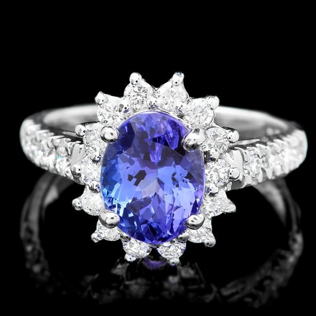 14k Gold 2.65ct Tanzanite 0.75ct Diamond Ring: Retail: $8,400.00 ****** 14k Gold 2.65ct Tanzanite 0.75ct Diamond Ring ****** Metal: 14k Solid White Gold / Size: 6.75 / Total Item Weight: 4.5 grams / Country Made: United States / / Main Stone: Tanz