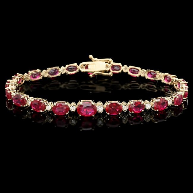 14k Gold 17.00ct Ruby 0.75ct Diamond Bracelet: Retail: $8,900.00 ****** 14k Gold 17.00ct Ruby 0.75ct Diamond Bracelet ****** Metal: 14k Solid Yellow Gold / Size: 7.5 / Total Item Weight: 11.0 grams / Country Made: United States / / Main Stone: Rub