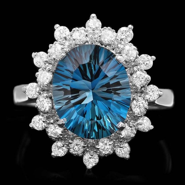 14k White Gold 3.80ct Topaz 0.65ct Diamond Ring: Retail: $4,800.00 ****** 14k White Gold 3.80ct Topaz 0.65ct Diamond Ring ****** Metal: 14k Solid White Gold / Size: 7.5 / Total Item Weight: 4 grams / Country Made: United States / / Main Stone: Topaz