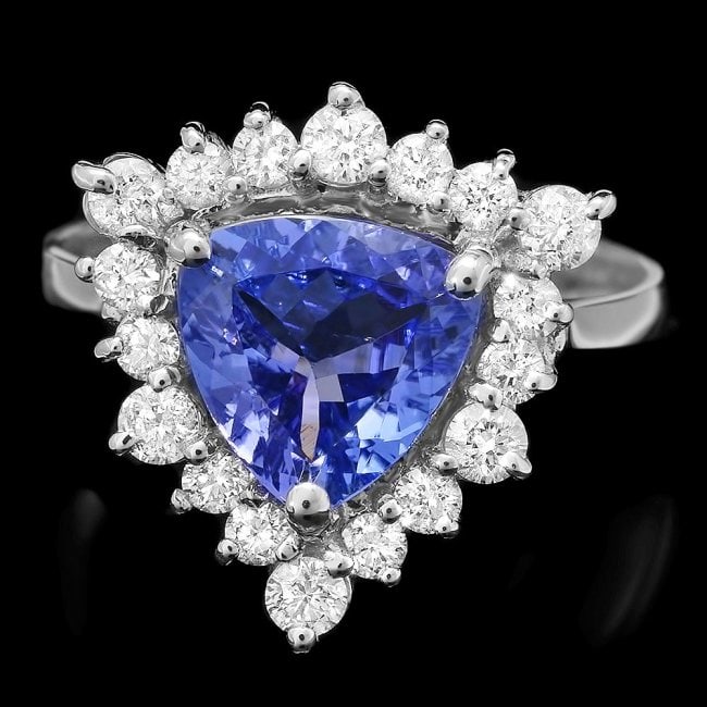 14k Gold 1.80ct Tanzanite 0.70ct Diamond Ring: Retail: $6,500.00 ****** 14k Gold 1.80ct Tanzanite 0.70ct Diamond Ring ****** Metal: 14k Solid White Gold / Size: 7.5 / Total Item Weight: 4.5 grams / Country Made: United States / / Main Stone: Tanza