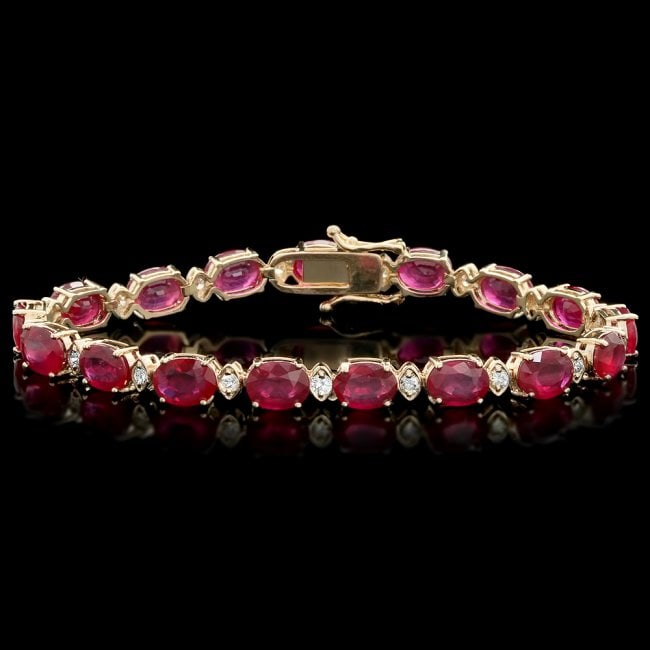 14k Gold 25.00ct Ruby 1.10ct Diamond Bracelet: Retail: $12,300.00 ****** 14k Gold 25.00ct Ruby 1.10ct Diamond Bracelet ****** Metal: 14k Solid Yellow Gold / Size: 7.5 / Total Item Weight: 17 grams / Country Made: United States / / Main Stone: Ruby