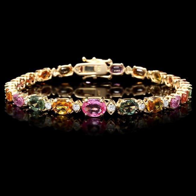 14k Gold 13.00ct Sapphire 0.80ct Diamond Bracelet: Retail: $9,300.00 ****** 14k Gold 13.00ct Sapphire 0.80ct Diamond Bracelet ****** Metal: 14k Solid Yellow Gold / Size: 7.5 / Total Item Weight: 11 grams / Country Made: United States / / Main Stone: S