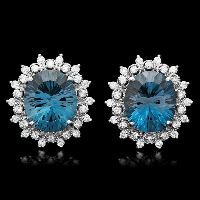 14k Gold 17.00ct Topaz 1.50ct Diamond Earrings: Retail: $11,300.00 ****** 14k Gold 17.00ct Topaz 1.50ct Diamond Earrings ****** Metal: 14k Solid White Gold / Total Item Weight: 10.0 grams / Country Made: United States / / Main Stone: Topaz / Color: