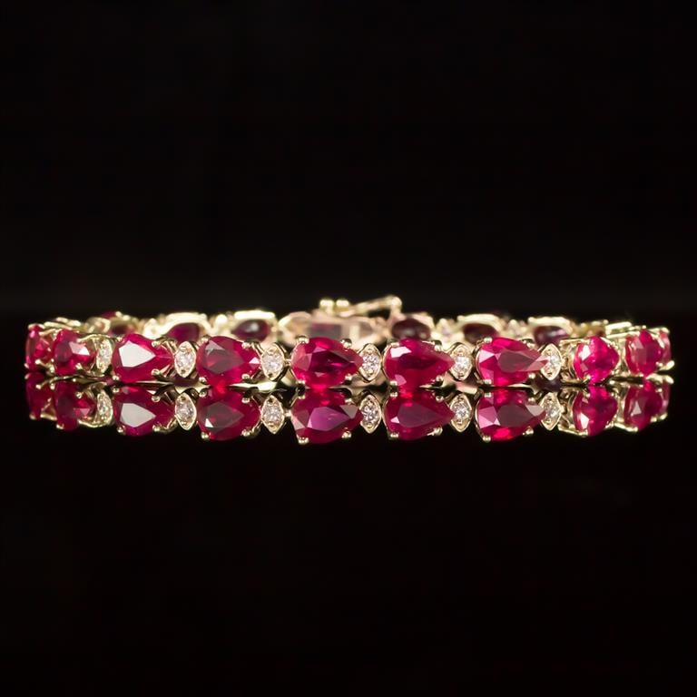 14K Gold 16.68ct Ruby 0.63ct Diamond Bracelet: Retail: $9,270.00 ****** 14K Gold Ruby & Diamond Bracelet ****** Metal: 14k Solid Yellow Gold / Total Item Weight: 10.9 grams / Country Made: United States / / Main Stone: Ruby / Color: Red / Carat To