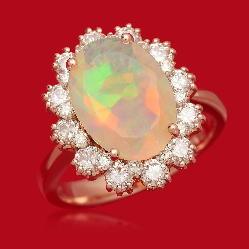 14K Gold 2.55ct Opal 1.18ct Diamond Ring: Retail: $5,685.00 ****** 14K Rose Gold 2.55ct Opal 1.18ct Diamond Ring****** Metal: 14K Solid Rose Gold / Total Item Weight: 5.7 grams / Country Made: United States / / Main Stone: Opal / Color: Play 