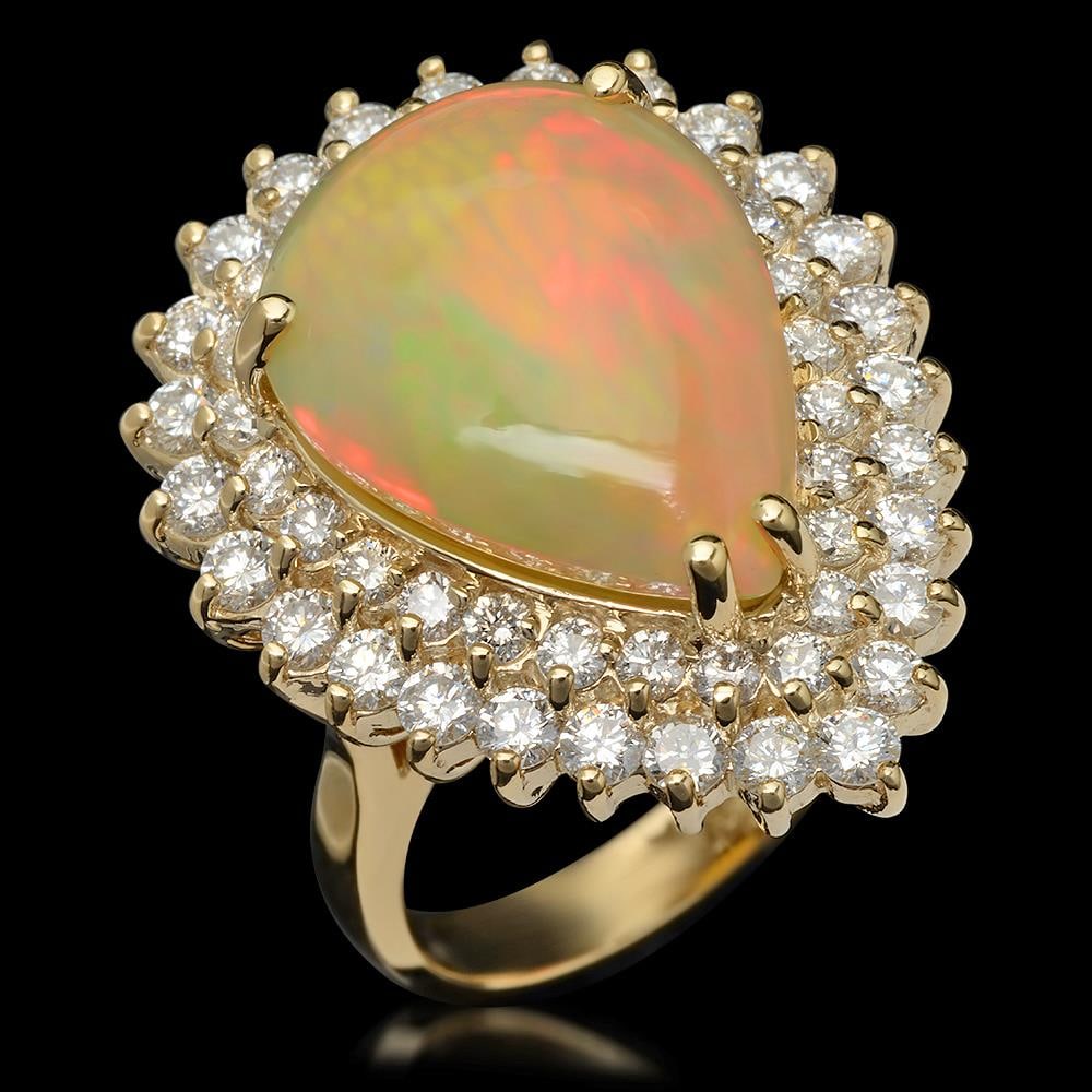 14K Gold 9.62ct Opal & 3.50ct Diamond Ring: Retail: $18,785.00****** 14K Gold Opal & Diamond Ring ****** Metal: 14K Solid Yellow Gold / Total Item Weight: 10.4 grams / Country Made: United States / / Main Stone: Opal / Color: Yellowish Orange /