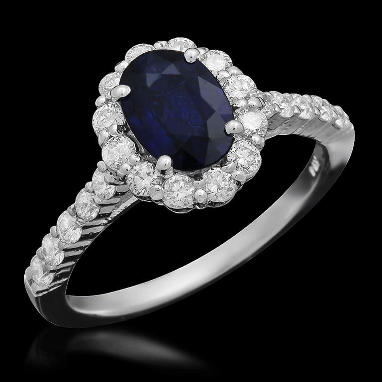 14K Gold 7.00ct Sapphire 0.72ct Diamond Ring: Retail: $3,570.00 ****** 14K Gold Sapphire & Diamond Ring ****** Metal: 14K Solid White Gold / Total Item Weight: 3.3 / Country Made: United States / / Main Stone: Sapphire / Color: Blue / Carat Total