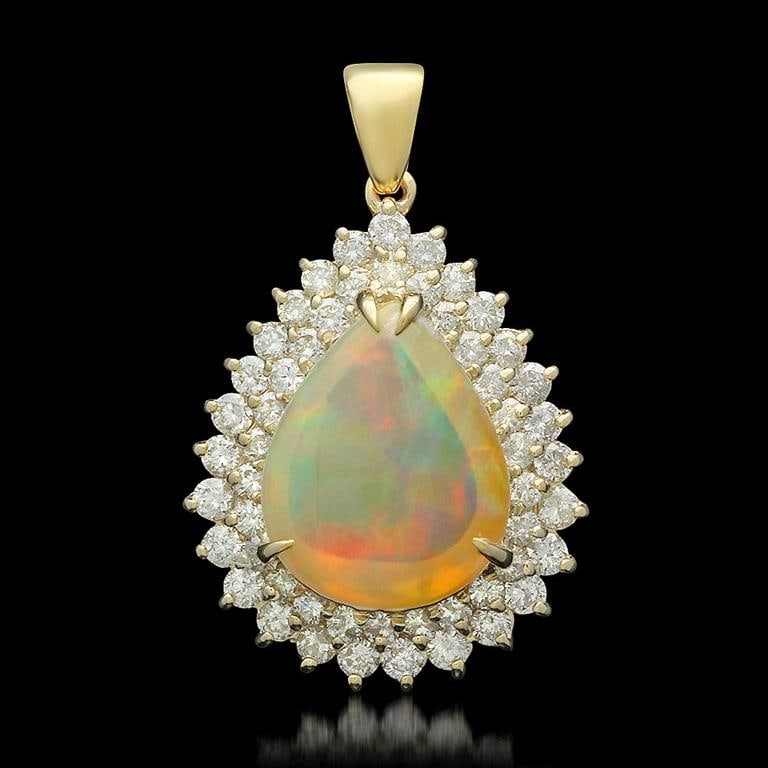 14K Gold 6.64ct Opal 1.95ct Diamond Pendant: Retail: $12,350.00 ******14K Gold Opal & Diamond Pendant****** Metal: 14K Solid Yellow Gold / Total Item Weight: 7.1 / Country Made: United States / / Main Stone: Opal / Color: Light Orange / Carat To