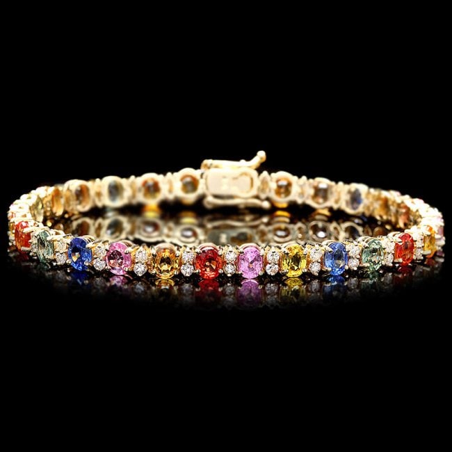 14k Gold 12ct Sapphire 1.80ct Diamond Bracelet: Retail: $16,200.00 ****** 14k Gold 12ct Sapphire 1.80ct Diamond Bracelet ****** Metal: 14k Solid White Gold / Size: 7.5 / Total Item Weight: 14.0 grams / Country Made: United States / / Main Stone: Sa