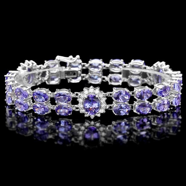 14k W Gold 29ct Tanzanite 1.40ct Diamond Bracelet: Retail: $22,750.00 ****** 14k W Gold 29ct Tanzanite 1.40ct Diamond Bracelet ****** Metal: 14k Solid White Gold / Size: 7 / Total Item Weight: 24.5 grams / Country Made: United States / / Main Stone: T
