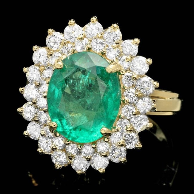 14k Gold 3.50ct Emerald 1.50ct Diamond Ring: Retail: $18,300.00 ****** 14k Gold 3.50ct Emerald 1.50ct Diamond Ring ****** Metal: 14k Solid Yellow Gold / Size: 7 / Total Item Weight: 7.0 grams / Country Made: United States / / Main Stone: Emerald