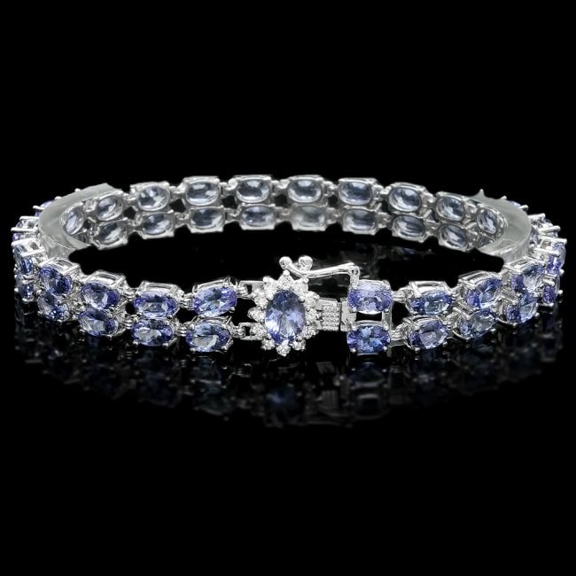 14k Gold 20ct Tanzanite .40ct Diamond Bracelet: Retail: $12,600.00 ****** 14k Gold 20ct Tanzanite .40ct Diamond Bracelet ****** Metal: 14k Solid White Gold / Size: 7 / Total Item Weight: 18.0 grams / Country Made: United States / / Main Stone: Tanz