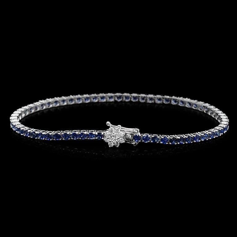 14K Gold 4.50ct Sapphire 0.40ct Diamond Bracelet: Retail: $5,526.00 ******14K Gold Sapphire & Diamond Bracelet ****** Metal: 14K Solid White Gold / Total Item Weight: 8.3 grams / Country Made: United States / / Main Stone: Sapphire/ Color: Blue / Car
