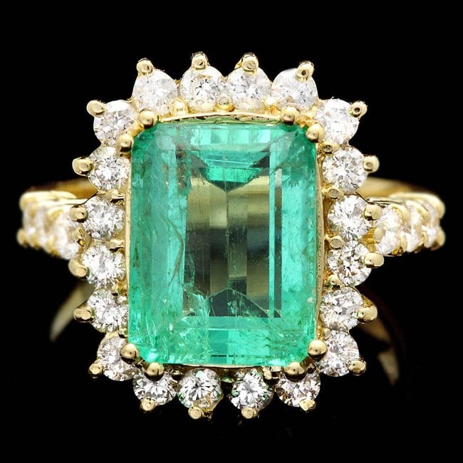 18k Gold 5.00ct Emerald 1.10ct Diamond Ring: Retail: $26,500.00 ****** 18k Gold 5.00ct Emerald 1.10ct Diamond Ring ****** Metal: 18k Solid Yellow Gold / Size: 7 / Total Item Weight: 7.5 grams / Country Made: United States / / Main Stone: Emerald