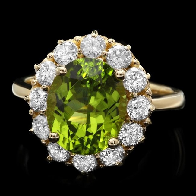 14k Gold 4.50ct Peridot 1.20ct Diamond Ring: Retail: $6,800.00 ****** 14k Gold 4.50ct Peridot 1.20ct Diamond Ring ****** Metal: 14k Solid Yellow Gold / Size: 8 / Total Item Weight: 5.5 grams / Country Made: United States / / Main Stone: Peridot 