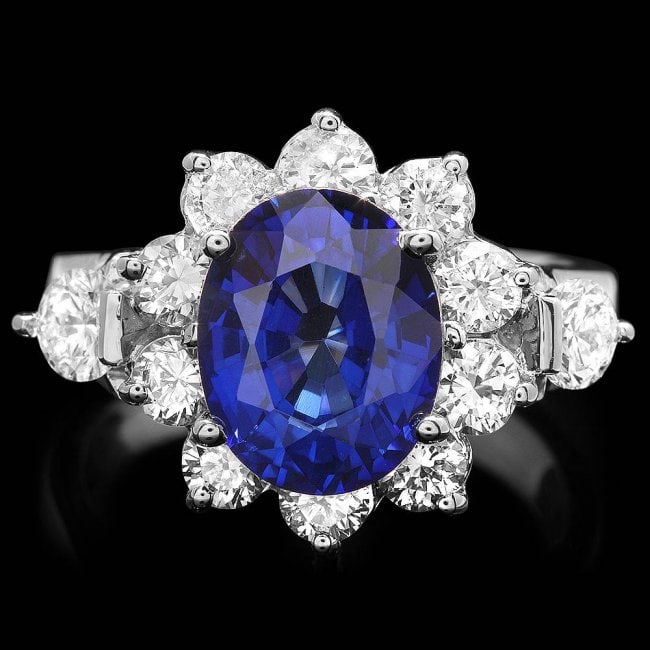 14k Gold 4.00ct Sapphire 1.55ct Diamond Ring: Retail: $12,800.00 ****** 14k Gold 4.00ct Sapphire 1.55ct Diamond Ring ****** Metal: 14k Solid White Gold / Size: 6.5 / Total Item Weight: 7.5 grams / / Main Stone: Sapphire / Color: Blue / Carat Tota