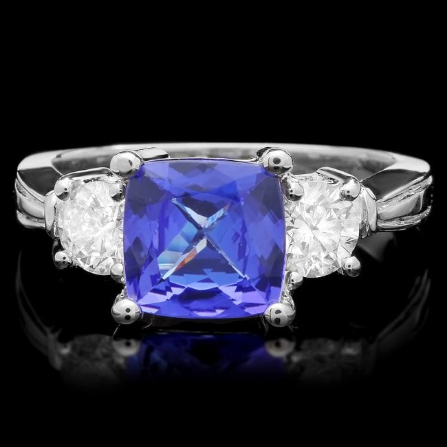 14k Gold 2.00ct Tanzanite 0.80ct Diamond Ring: Retail: $8,750.00 ****** 14k Gold 2.00ct Tanzanite 0.80ct Diamond Ring ****** Metal: 14k Solid White Gold / Size: 6.5 / Total Item Weight: 5.5 grams / Country Made: United States / / Main Stone: Tanza