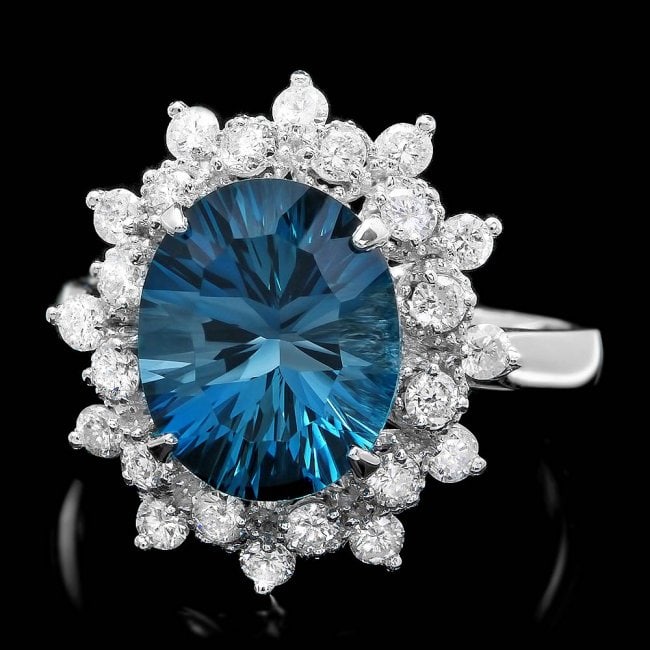 14k White Gold 4.00ct Topaz 0.70ct Diamond Ring: Retail: $4,800.00 ****** 14k White Gold 4.00ct Topaz 0.70ct Diamond Ring ****** Metal: 14k Solid White Gold / Size: 7.5 / Total Item Weight: 4.50 grams / Country Made: United States / / Main Stone: To