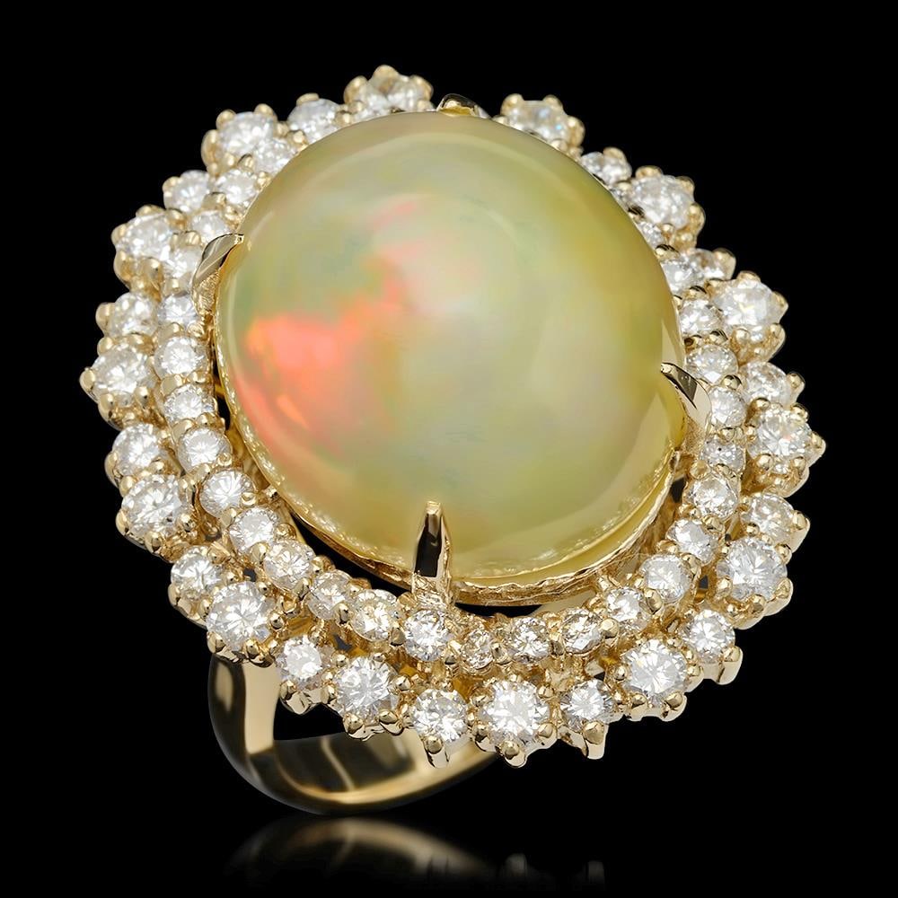 14K Gold 12.56ct Opal & 2.07ct Diamond Ring: Retail: $17,138.00****** 14K Gold Opal & Diamond Ring ****** Metal: 14K Solid Yellow Gold / Total Item Weight: 11.4 grams / Country Made: United States / / Main Stone: Opal / Color: Play of Color / Ca