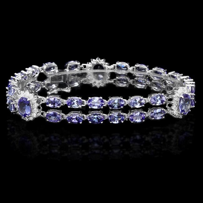 14k Gold 19ct Tanzanite 1.20ct Diamond Bracelet: Retail: $18,900.00 ****** 14k Gold 19ct Tanzanite 1.20ct Diamond Bracelet ****** Metal: 14k Solid White Gold / Size: 7 / Total Item Weight: 18.5 grams / Country Made: United States / / Main Stone: Tan