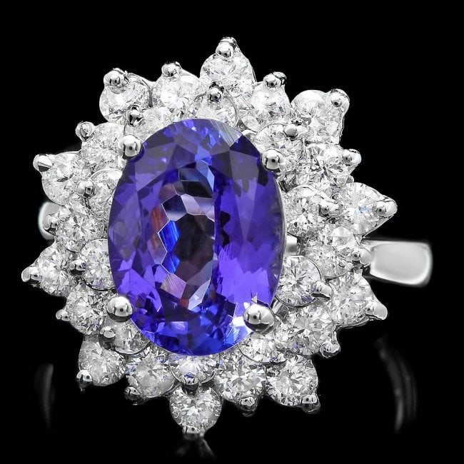 14k Gold 3.50ct Tanzanite 1.70ct Diamond Ring: Retail: $11,400.00 ****** 14k Gold 3.50ct Tanzanite 1.70ct Diamond Ring ****** Metal: 14k Solid White Gold / Size: 7.25 / Total Item Weight: 6.0 grams / Country Made: United States / / Main Stone: Tan