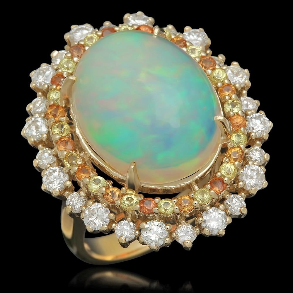 14K Gold 10.00ct Opal 0.80ct Sapphire 1.00ct Diamond Ring: Retail: $12,780.00 ****** 14K Gold 10.00ct Opal 0.80ct Fancy Color Sapphire 1.00ct Diamond Ring ****** Metal: 14K Solid Gold / Total Item Weight: 9.8 grams / Country Made: United States / / Main Stone