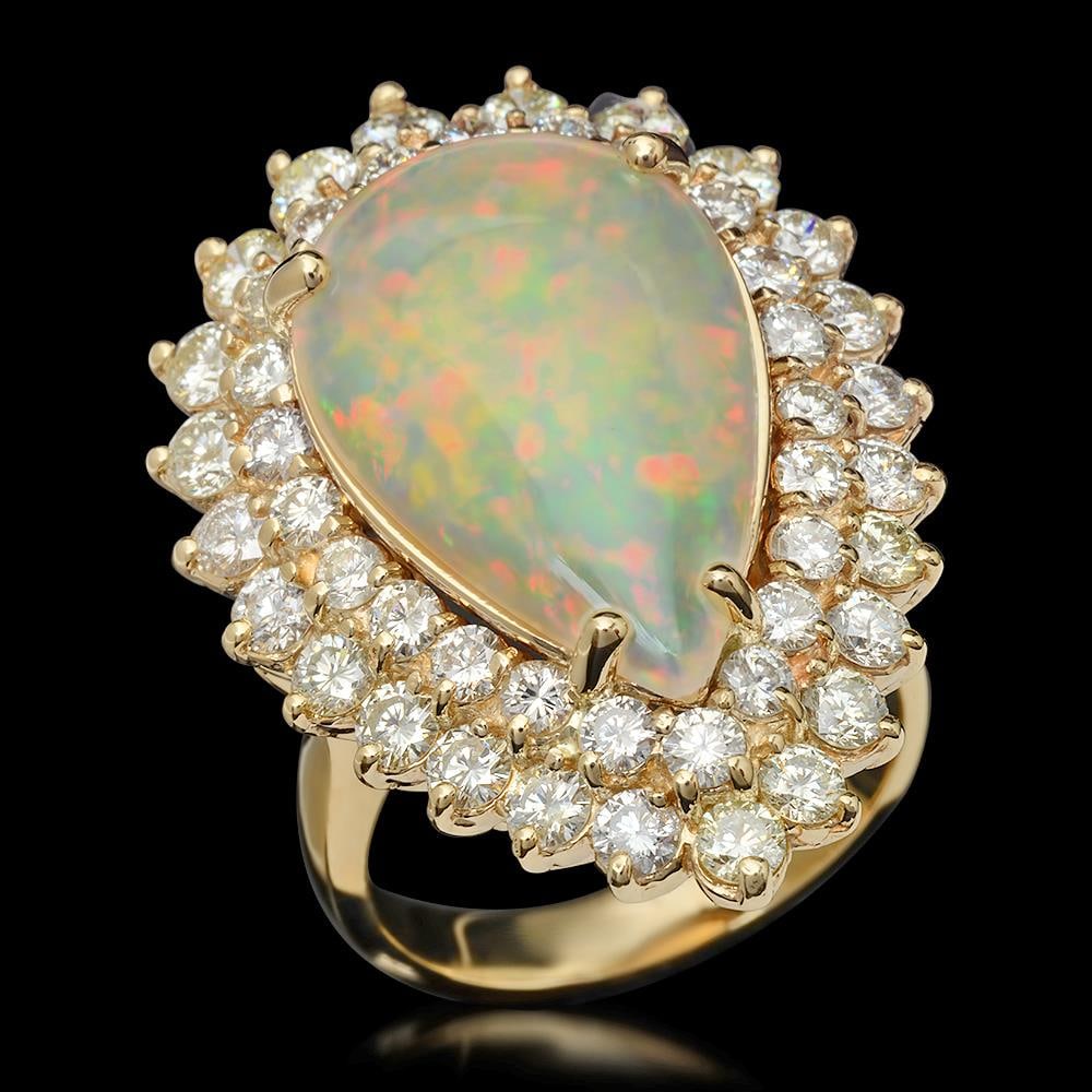 14K Gold 5.32ct Opal & 3.21ct Diamond Ring: Retail: $16,560.00****** 14K Gold Opal & Diamond Ring ****** Metal: 14K Solid Yellow Gold / Total Item Weight: 13.6 grams / Country Made: United States / / Main Stone: Opal / Color: Play of Color / Ca