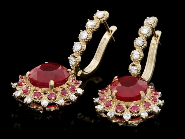 14k Gold 7.5ct Ruby 1.00ct Diamond Earrings: Retail: $6,000.00 ****** 14k Gold 7.5ct Ruby 1.00ct Diamond Earrings ****** Metal: 14k Solid Yellow Gold / Total Item Weight: 10.0 grams / Country Made: United States / / Main Stone: Ruby / Color: Red