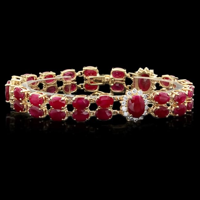 14k Gold 36.0ct Ruby 1.90ct Diamond Bracelet: Retail: $28,500.00 ****** 14k Gold 36.0ct Ruby 1.90ct Diamond Bracelet ****** Metal: 14k Solid Yellow Gold / Size: 7 / Total Item Weight: 25.8 grams / Country Made: United States / / Main Stone: Ruby 