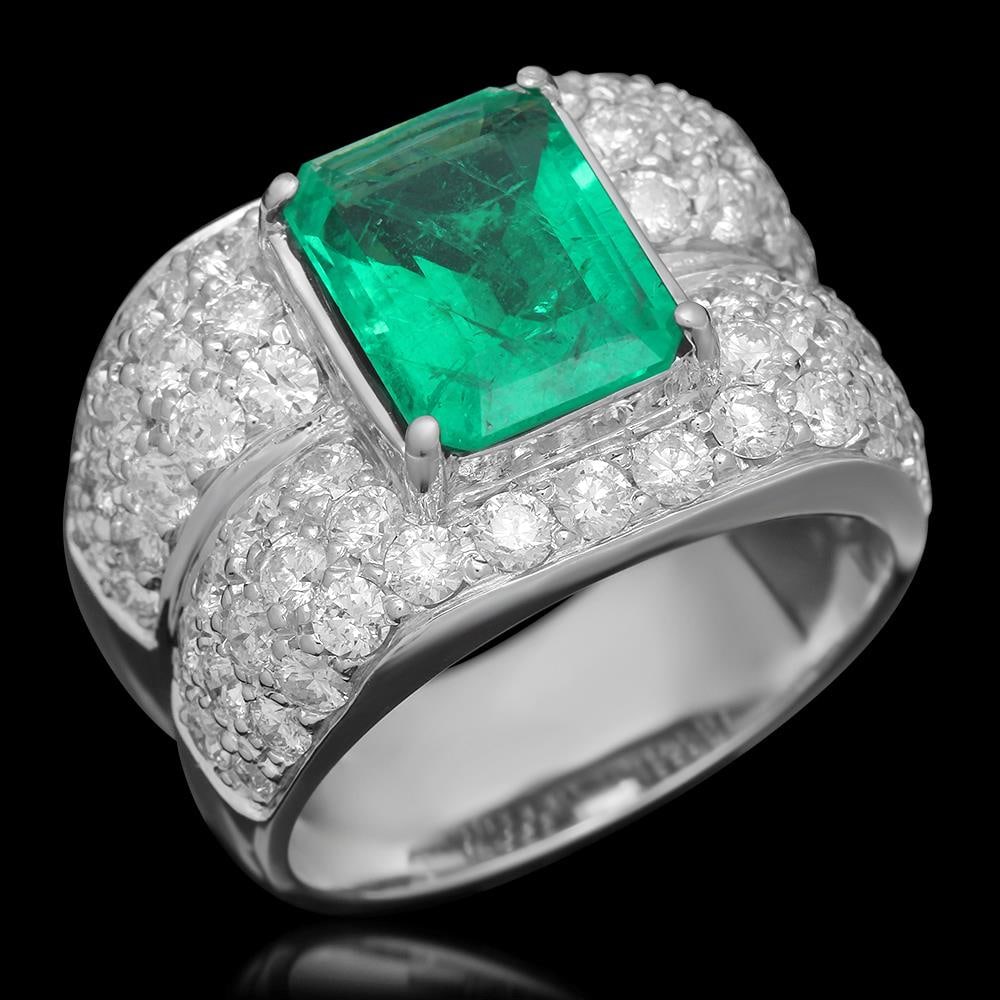 14K Gold 3.45 Emerald 3.68 Diamond Ring: Retail: $25,406.00 ******14K Gold 3.45 Emerald 3.68 Diamond Ring****** Metal: 14K Solid Gold / Total Item Weight: 14.2 grams / Country Made: United States / / Main Stone: Emerald / Color: Green / Cara