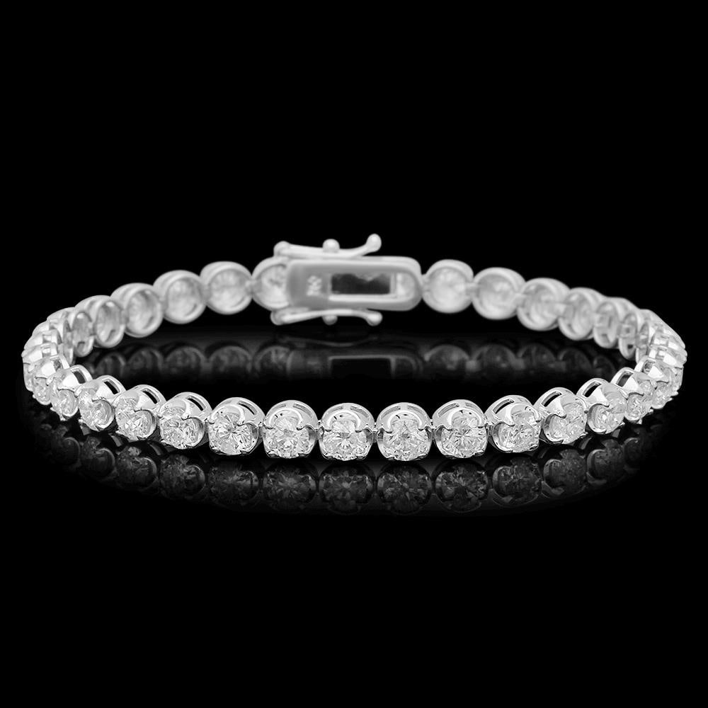 18K Gold 8.67ct Diamond Bracelet: Retail: $39,870.00 ****** 18K Gold 8.67ct Diamond Bracelet ****** Metal: 18K Solid Gold / Total Item Weight: 13.4 grams / Country Made: United States / / Main Stone: Diamond / Carat Total Weight: 8.67