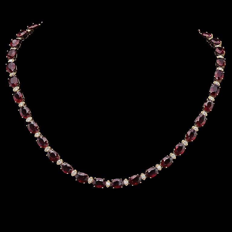 14K Gold 61.41ct Ruby & 2.21ct Diamond Necklace: Retail: $28,624.00******14K Gold Ruby & Diamond Necklace****** Metal: 14K Solid Gold / Total Item Weight: 34.6 grams/ Country Made: United States / / Main Stone: Ruby / Color: Red / Carat Total Weight