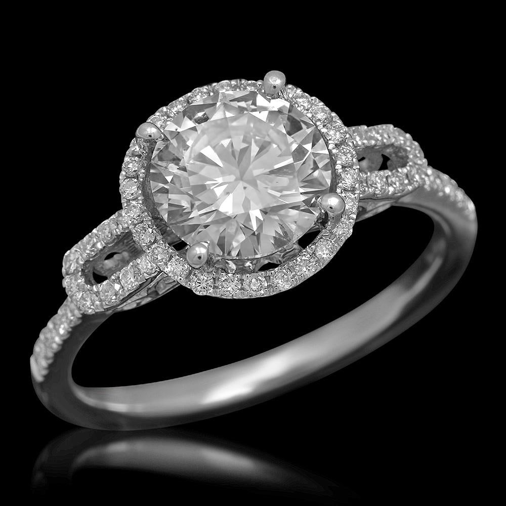 14K Gold 1.79ct Diamond Ring: Retail: $17,520.00 ****** 14K Gold 1.79cts Diamond Ring ****** Metal: 14K Solid Gold / Total Item Weight: 2.4 grams / Country Made: United States / / Main Stone: Diamond / Carat Total Weight: 1.52 / T