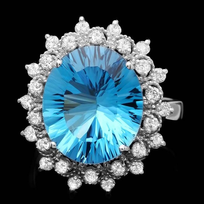 14k White Gold 7.00ct Topaz 0.70ct Diamond Ring: Retail: $6,200.00 ****** 14k White Gold 7.00ct Topaz 0.70ct Diamond Ring ****** Metal: 14k Solid White Gold / Size: 7 / Total Item Weight: 6.1 grams / Country Made: United States / / Main Stone: Topaz
