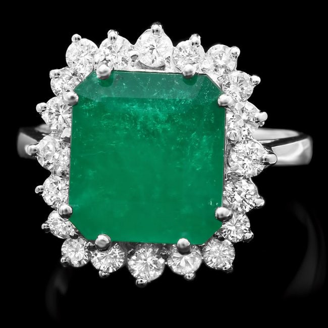 14k White Gold 4ct Emerald 0.80ct Diamond Ring: Retail: $18,500.00 ****** 14k White Gold 4ct Emerald 0.80ct Diamond Ring ****** Metal: 14k Solid White Gold / Size: 7.5 / Total Item Weight: 5 grams / Country Made: United States / / Main Stone: