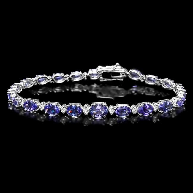 14k 11.00ct Tanzanite 0.75ct Diamond Bracelet: Retail: $9,300.00 ****** 14k 11.00ct Tanzanite 0.75ct Diamond Bracelet ****** Metal: 14k Solid White Gold / Size: 7.25 / Total Item Weight: 10.30 grams / Country Made: United States / / Main Stone: Ta
