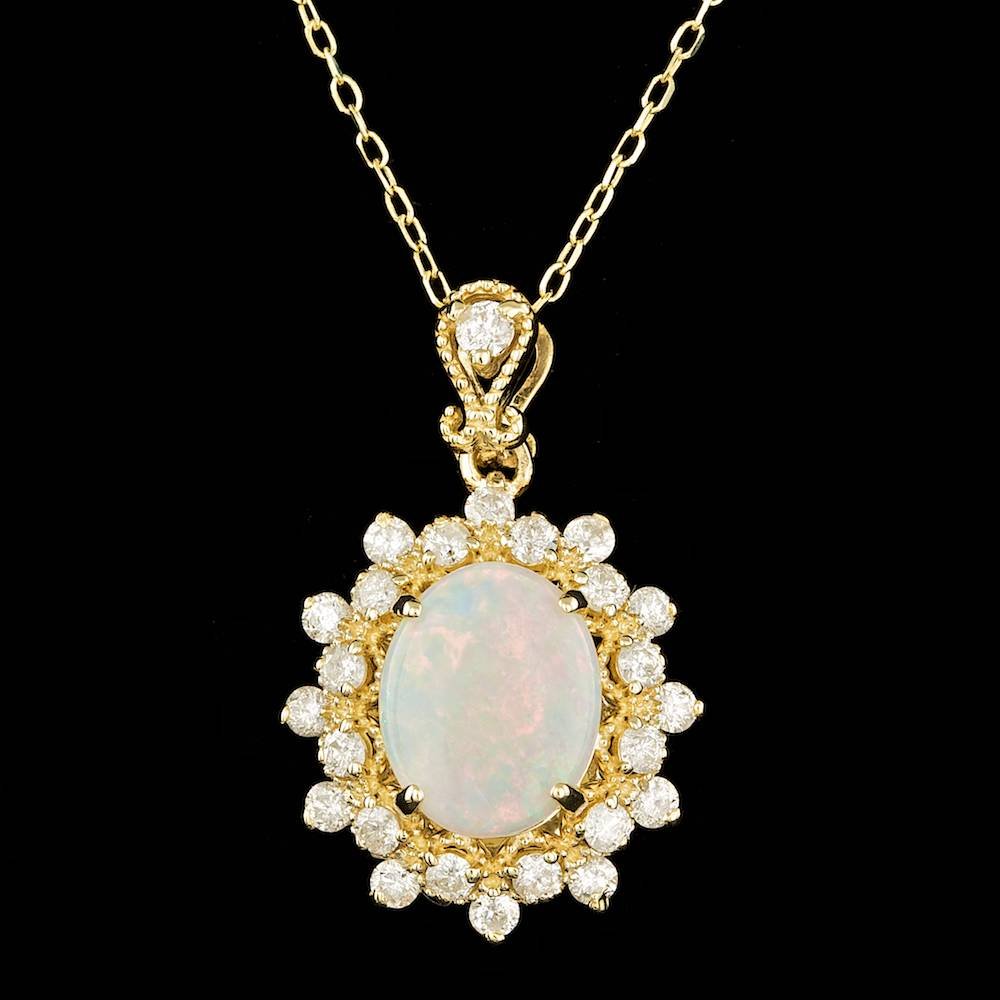 14k Gold 1.00ct Opal 0.70ct Diamond Pendant: Retail: $6,200.00 ****** 14k Gold 1.00ct Opal 0.70ct Diamond Pendant ****** Metal: 14k Solid Yellow Gold / Size: 18 / Total Item Weight: 4.0 grams / Country Made: United States / / Main Stone: Opal /