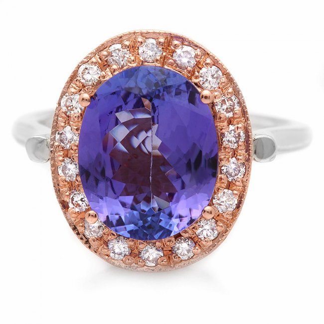 14k Gold 5ct Tanzanite .40ct Diamond Ring: Retail: $12,100.00 ****** 14k Gold 5ct Tanzanite .40ct Diamond Ring ****** Metal: 14k Solid Multi-Tone Gold / Size: 7.5 / Total Item Weight: 6.5 grams / Country Made: United States / / Main Stone: Tan