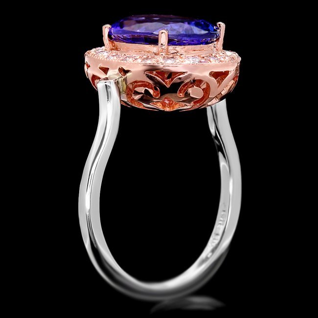 14k Gold 5ct Tanzanite .40ct Diamond Ring: Retail: $12,100.00 ****** 14k Gold 5ct Tanzanite .40ct Diamond Ring ****** Metal: 14k Solid Multi-Tone Gold / Size: 7.5 / Total Item Weight: 6.5 grams / Country Made: United States / / Main Stone: Tan