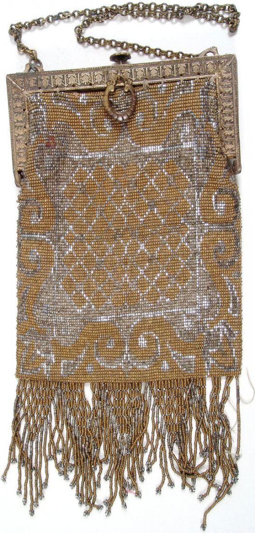 Vtg Art Deco 1920s Beaded Fringe Purse-Metallic Beads: This is a vintage Art Deco Roaring 20s flapper metallic beaded handbag with fringe. Metal frame, push closure, decorative hang tag and chain.It looks like part of the design is steel cut making a nice