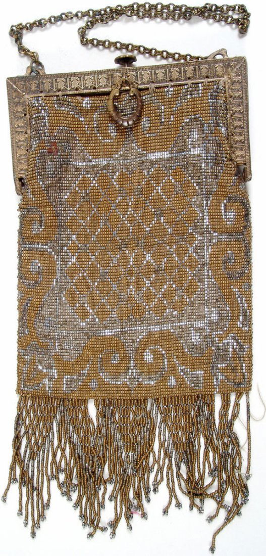 Vtg Art Deco 1920s Beaded Fringe Purse-Metallic Beads: This is a vintage Art Deco Roaring 20s flapper metallic beaded handbag with fringe. Metal frame, push closure, decorative hang tag and chain. It looks like part of the design is steel cut making a nic