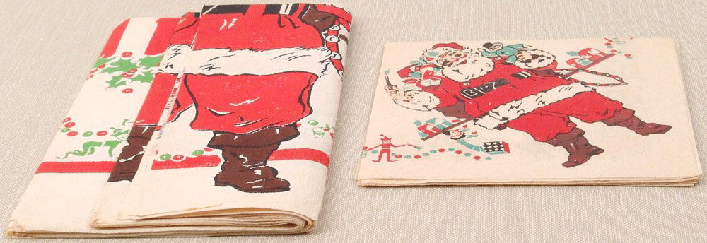 Vintage Paper TABLECLOTH & NAPKINS-1940s? SANTA Pattern: This is an adorable set of vintage paper tablecloths and four napkins.Almost perfectly preserved original folds and Santa Claus and his toys are featured in a repeat pattern. He is holding a paintbrus