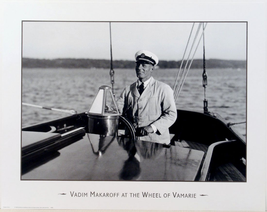 1999 Poster Vadim Makaroff at Wheel of USS Vamarie: This is a vintage 1999 photo print by Edwin Levick of Vadim Makaroff at the wheel of the USS Vamarie. A scarce and hard-to-find superb lithographic print. Printed by New York Graphique. SIZE: Approx. 